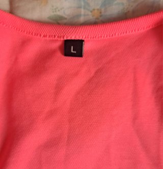 Camiseta tirantes chica rosa fluorescente