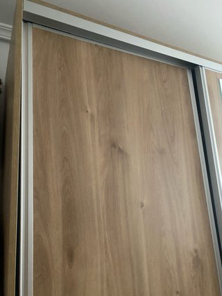 Armario puertas correderas madera y cristal