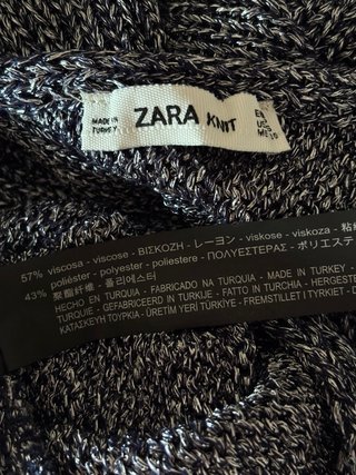 Jersey T.S efecto metalizado gris Zara