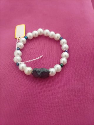 Pulsera Tous perlas y mariposa negra