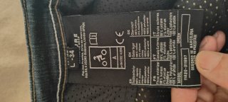 Pantalones vaqueros de moto grises y azules