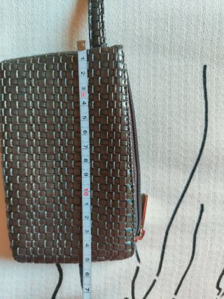 Cartera trenzada Plata con colgante