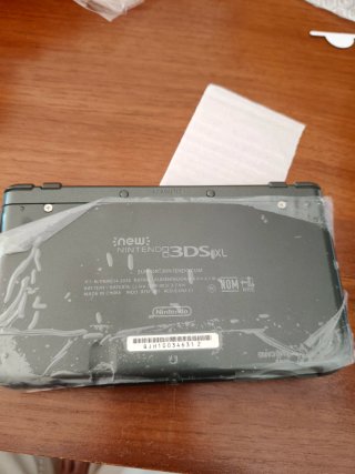 New Nintendo 3DS XL Negra impoluta. Incluye funda