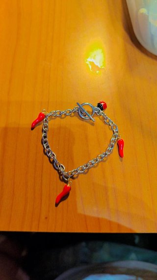 Braccialetto acciaio cornetti e coccinella