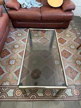 Mesa de centro cristal y metal dorado