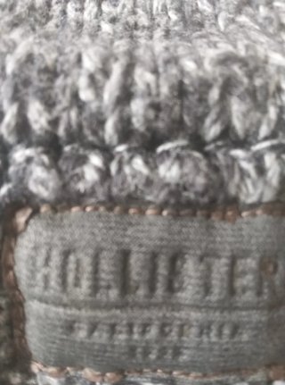 Chaqueta Hollister gris con cremallera