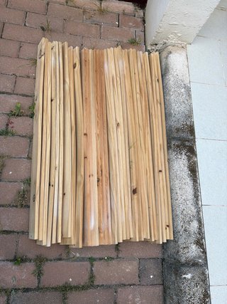 Litera blanca con cama nido y cajonera con ruedas.
