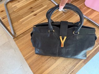 Bolso Yves Saint Laurent YSL Negro Dorado