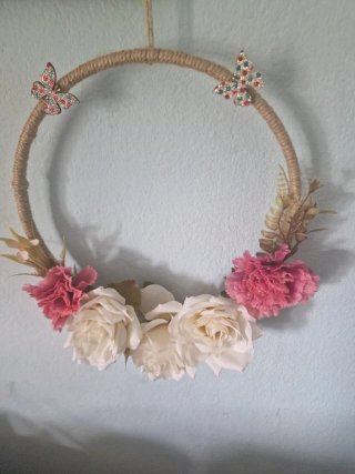 Botella decorada con flores yute