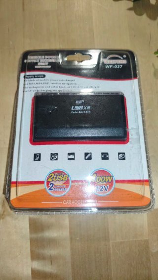 Adaptador/extensor de corriente para el coche