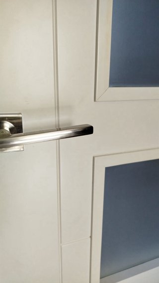 Puerta de paso blanca con 4 cristales