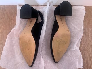 Zapatos negros destalonados Stradivarius ante