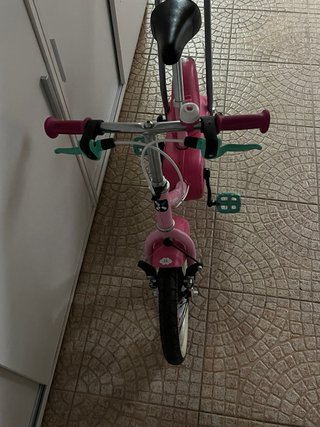 Bicicleta infantil rosa con ruedas de 12 pulgadas