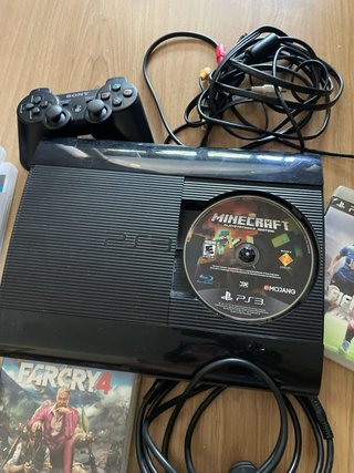 Consola PS3 con juegos y mando