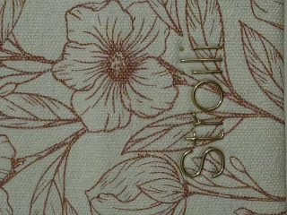 Pochette rosa cipria con fiori