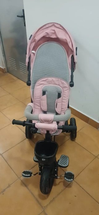 Triciclo infantil rosa con capota