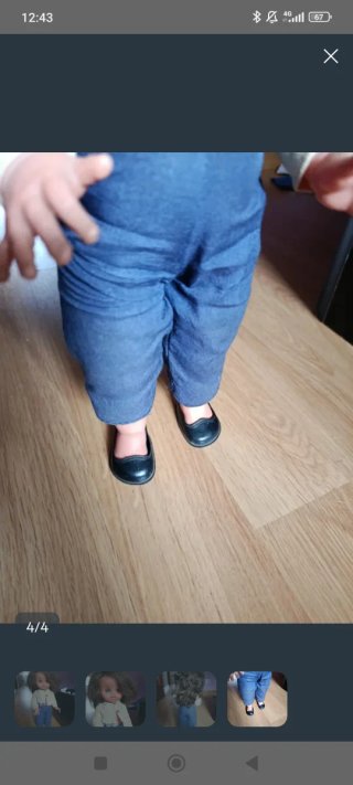 Muñeca antigua con traje de aviador