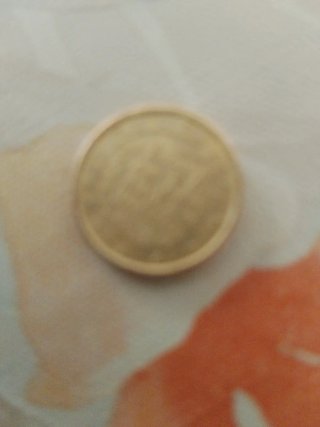 Moneda antigua de oro