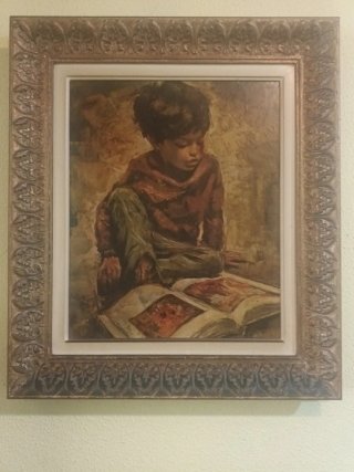 Cuadro niño leyendo libro