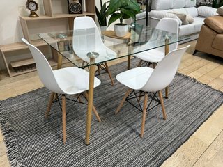 Mesa de cristal con 4 sillas blancas