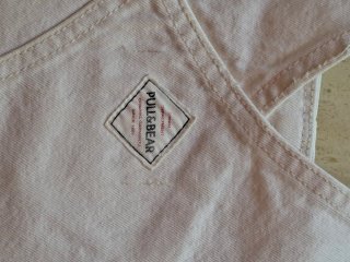 Falda vaquera beige con tirantes