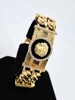 049-05-00340 Pulsera tipo Versace Oro 18K