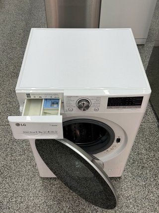 Lavadora con sacadora LG Direct Drive 9+6