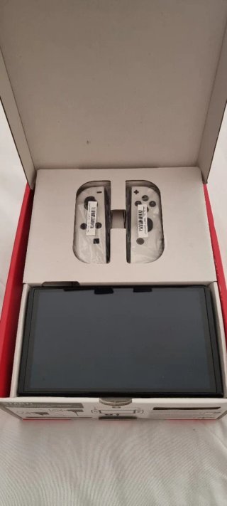 Nintendo Switch OLED + Funda
