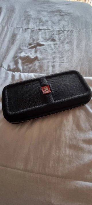 Nintendo Switch OLED + Funda