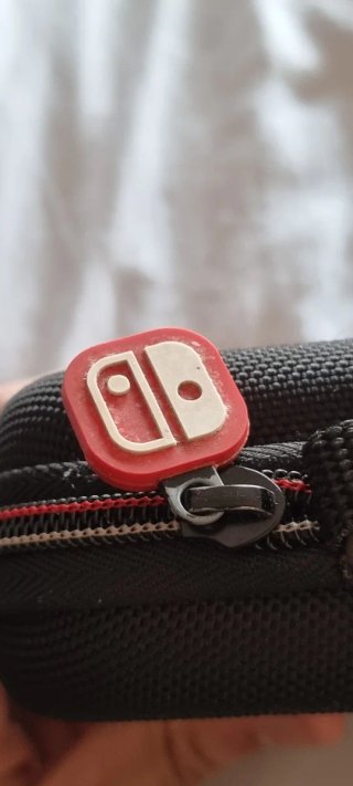 Nintendo Switch OLED + Funda