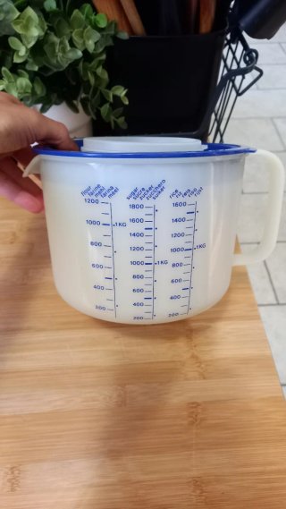 Brocca graduata Tupperware trasparente blu