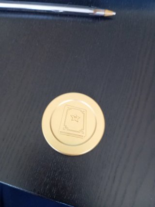 Moneda McDonald's Libro Dorado