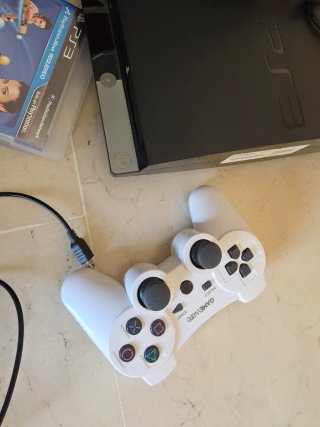 Consola PS3 + Accesorios y Juegos
