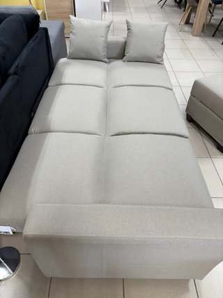 Sofá cama beige con doble arcón