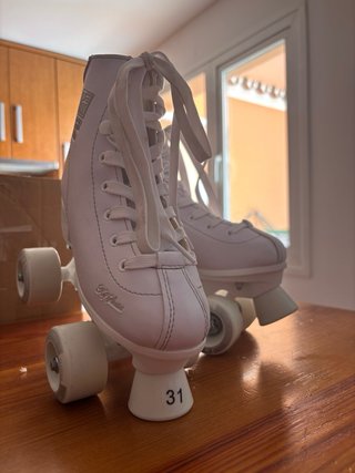 Patines blancos 4 ruedas T31