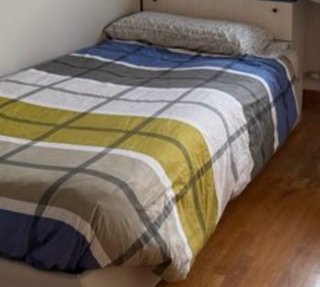 Funda de cama a cuadros azul y amarillo
