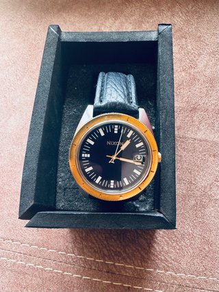 Reloj Nixon Azul y Dorado