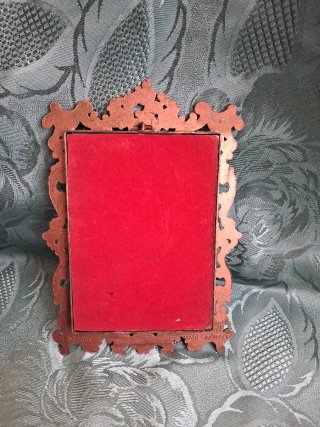 Cornice in ottone dorato e rosa
