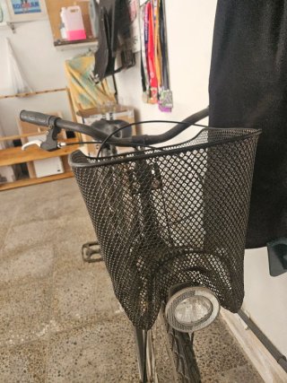 Bicicleta de paseo BTWIN gris con cesta