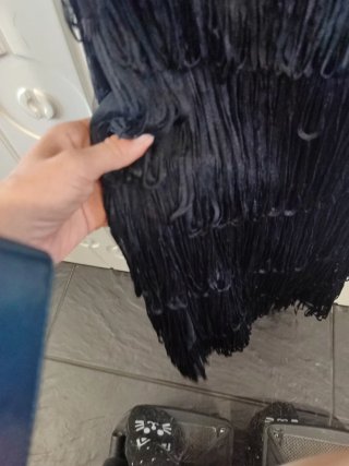 Vestido corto negro con flecos