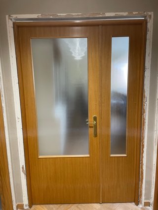 Puerta doble de salón con cristal