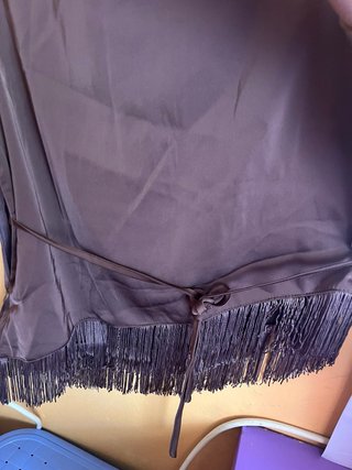 Camisa sin mangas con flecos