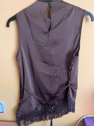 Camisa sin mangas con flecos