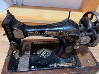 Máquina de coser antigua Manufacturing Co