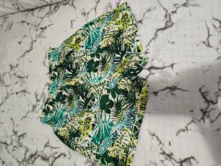 Bermudas verdes estampado tropical