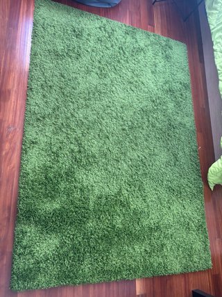 Alfombra verde mullida