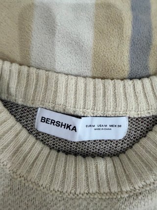 Jersey beige con frase A thousand miles