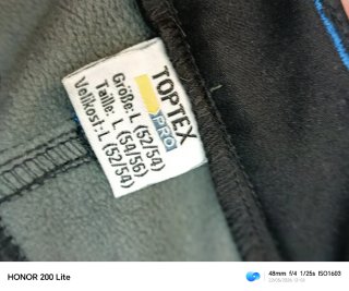 Pantalones de trabajo negros con detalles azules