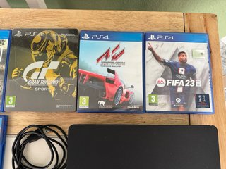 PS4 (PlayStation 4) + 9 Juegos y 2 Mandos