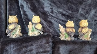 Set di 4 figure decorative di gufi in resina 10 cm